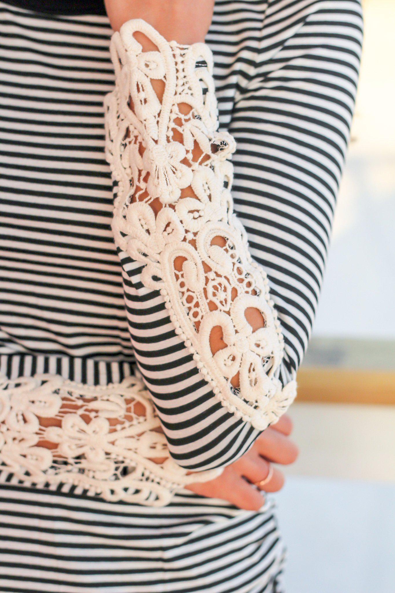 Stylish Black and White Striped Long Sleeve Top with Crochet Sleeve Design